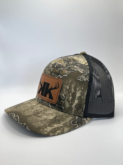 Split Rack Real Tree Escape/Black Trucker Hat